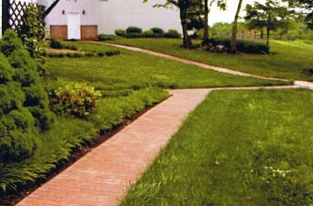 Red brick-stamped concrete sidewalk in Morristown TN with decorative colored concrete finish