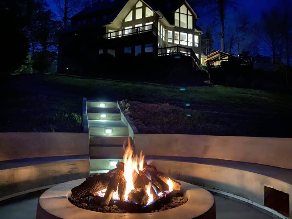 custom concrete firepit seating with integrated lighting and USB ports by Crescostone in East Tennessee