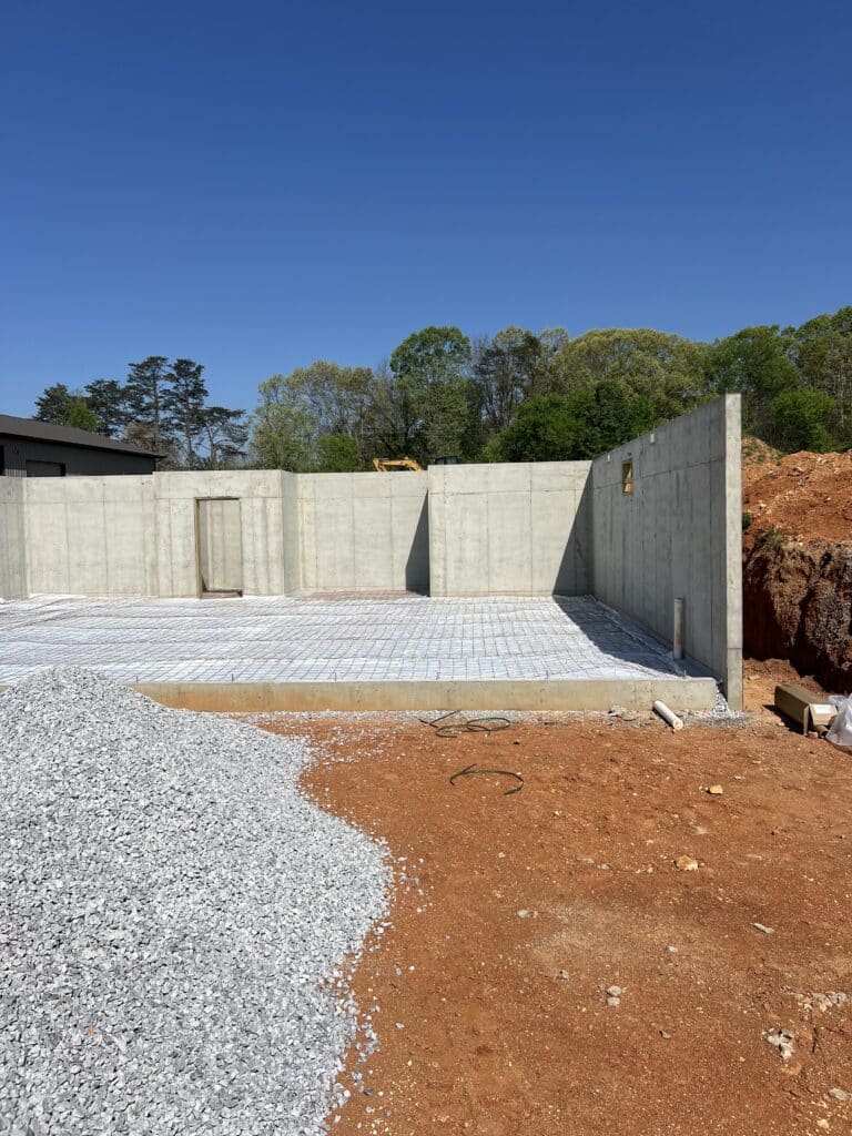 poured concrete walls foundation and basement slab prep with drainage hookups in Jefferson City TN