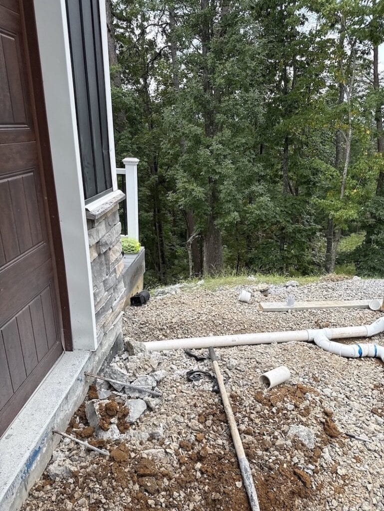 Crescostone fixing work by reinstalling slab and drain system after a bad contractor caused water to flow toward the house