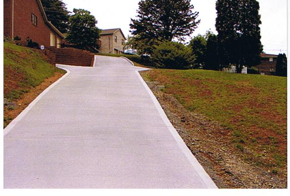 Concrete driveway with picture frame edge installed by Crescostone in Newport Tennessee